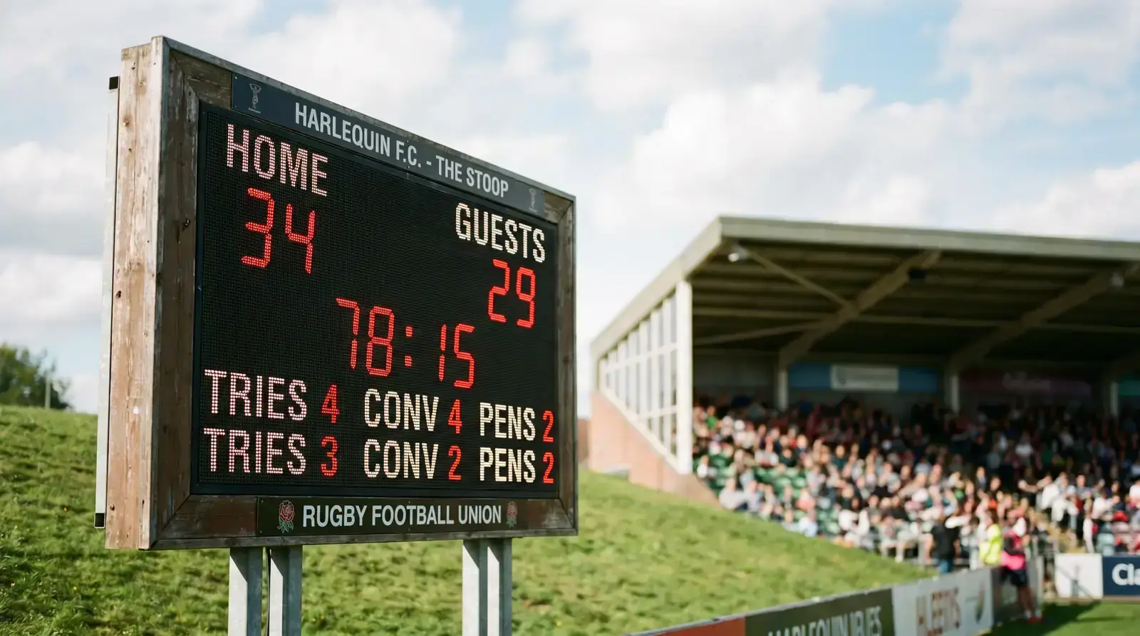 Stadium scoreboard showing a high-scoring rugby league total points line
